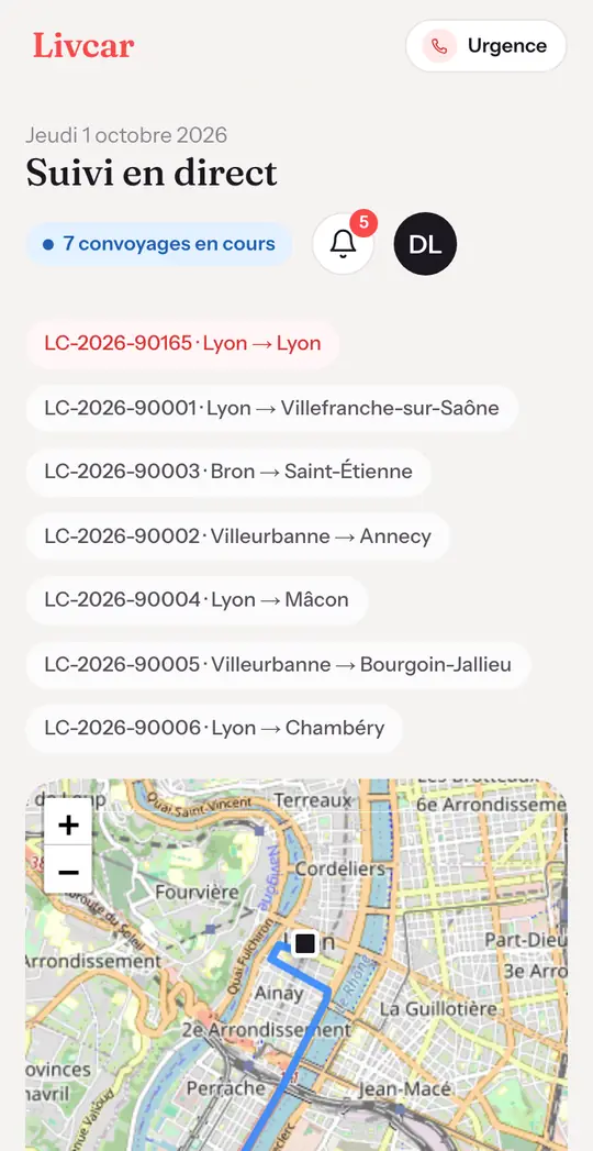 Écran de suivi en direct côté garage : liste des convoyages en cours et carte de Lyon avec le trajet et la position du véhicule.